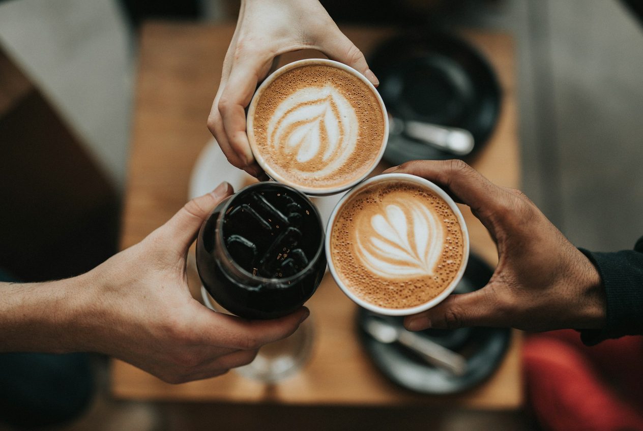 Coffee bar with cups and espresso machine